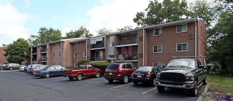 Canal House Apartments brick residence buildings with private balconies and resident parking